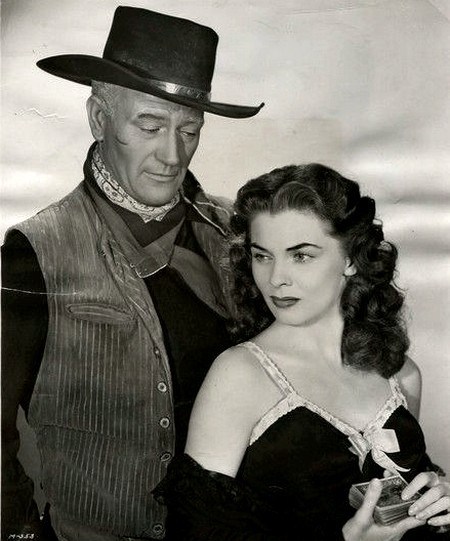 Joanne Dru with John Wayne pic