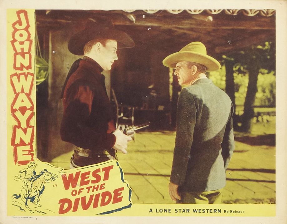 Lobby card for West of the Divide with John Wayne