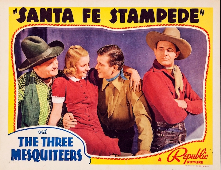 Movie lobby card for Santa Fe Stampede with John Wayne 1938