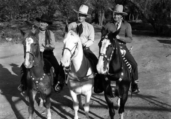 of John Wayne The '3 Mesquitos' including John Wayne on horseback in Red River Range movie