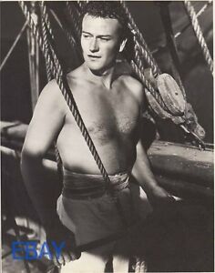 Movie poster for Sea Spoilers with a bare chested JOhn Wayne