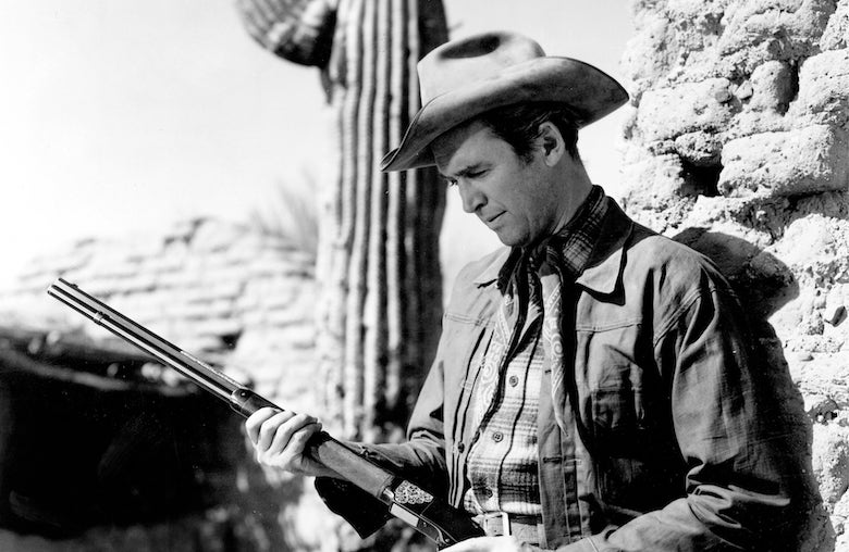 James Stewart holding his gun in Winchester '73